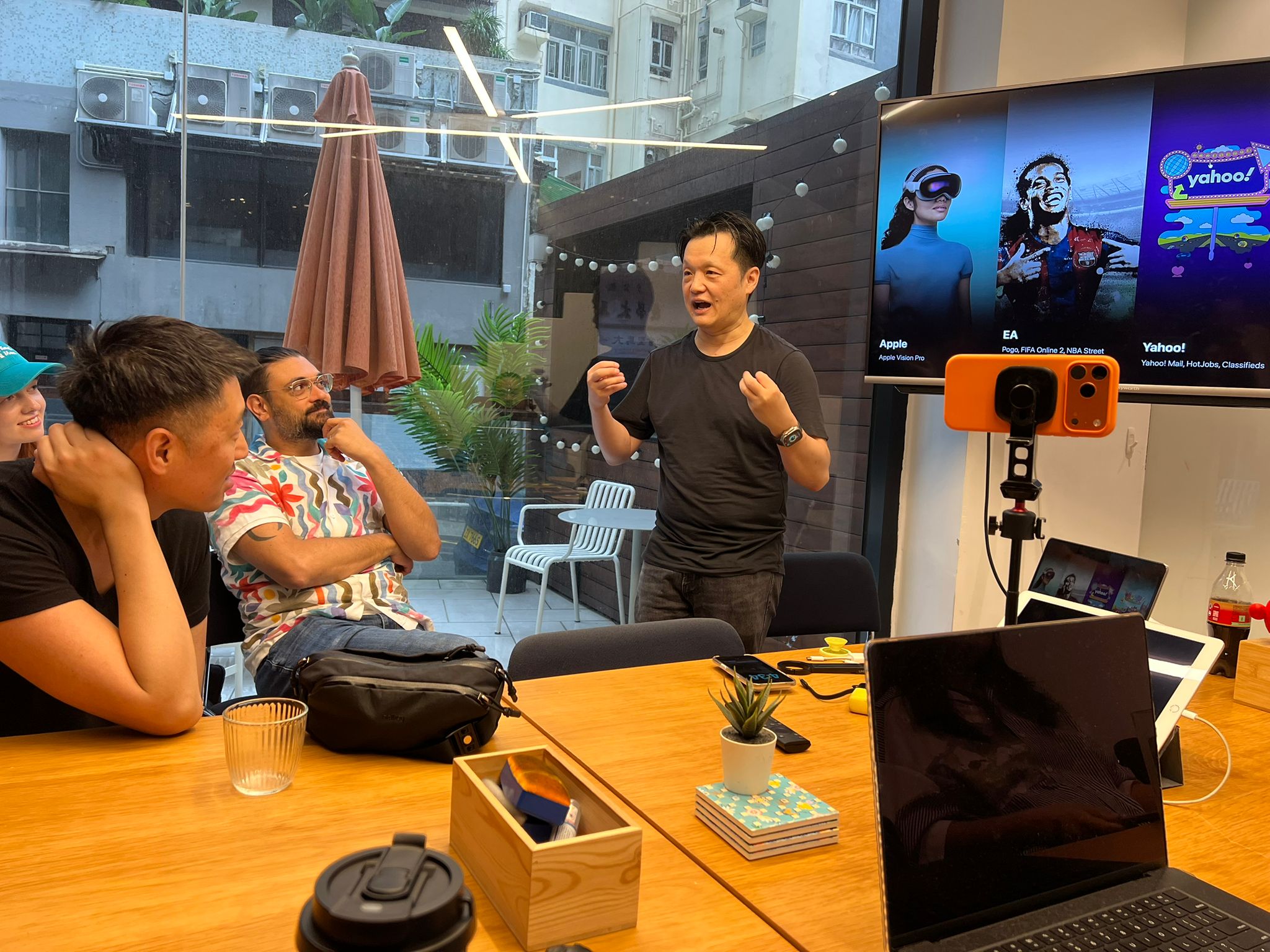 LokLok presenting metaverse control demo with engaged attendees