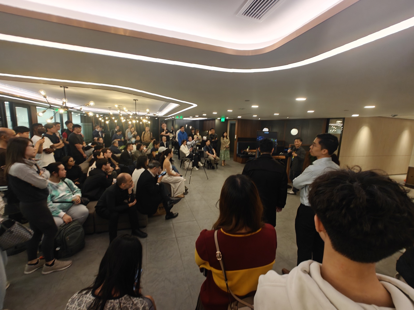 Packed crowd at the Lunatechs OpenClaw LIVE DEMO meetup at Compass offices