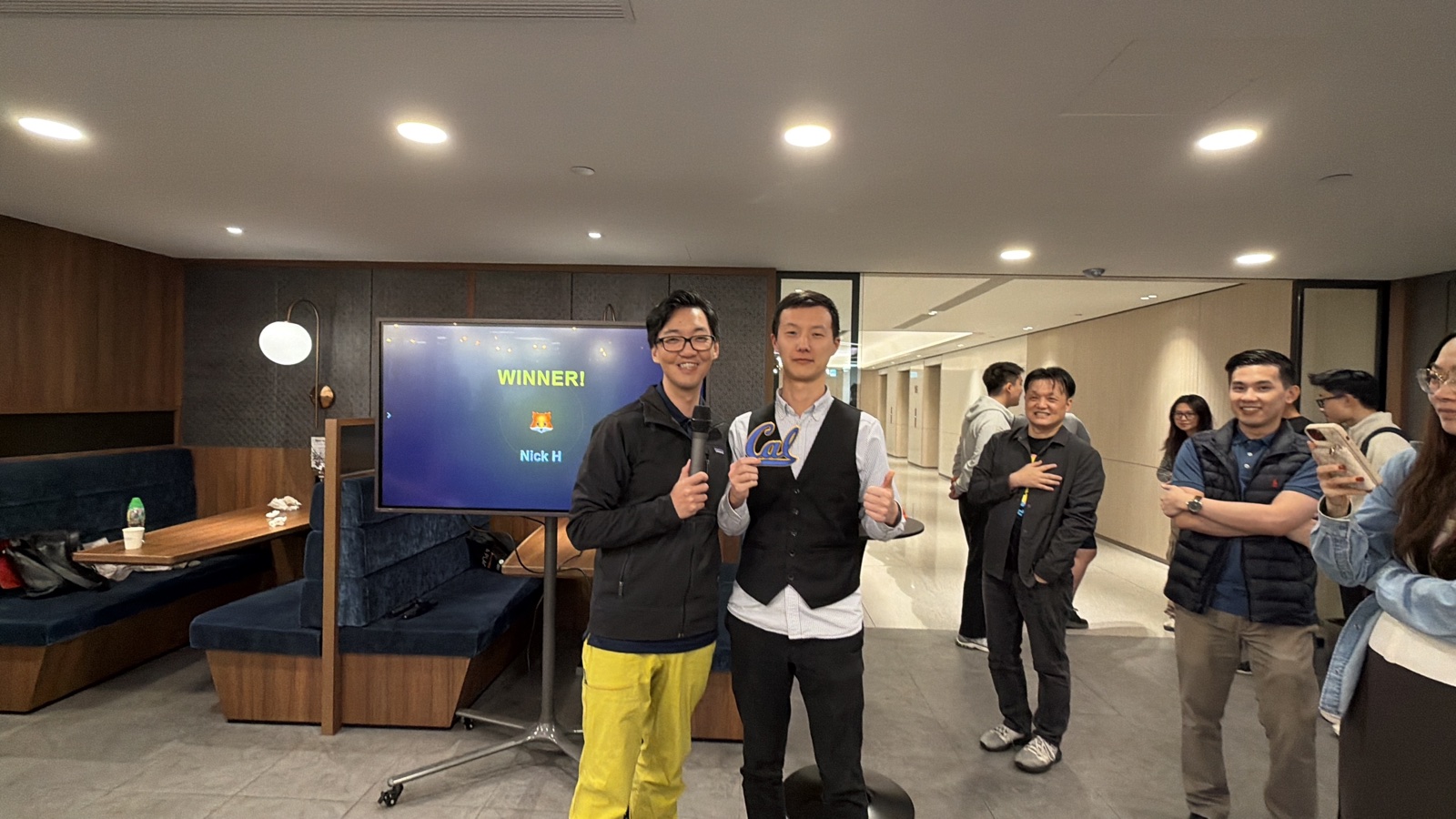 Lucky draw winner Nick H holding 3D-printed Cal logo with WINNER screen showing Nick H