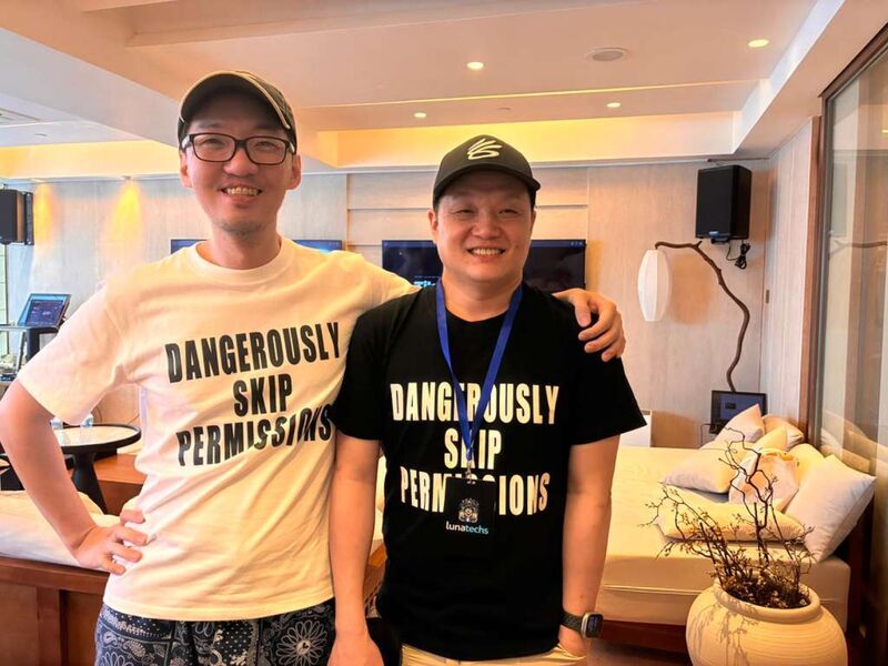 Hanley Leung and Jason Xu in matching Dangerously Skip Permissions tees